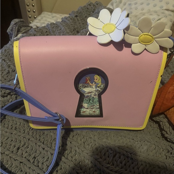Loungefly Handbags - Used Alice In wonderland keyhole cross body Loungefly